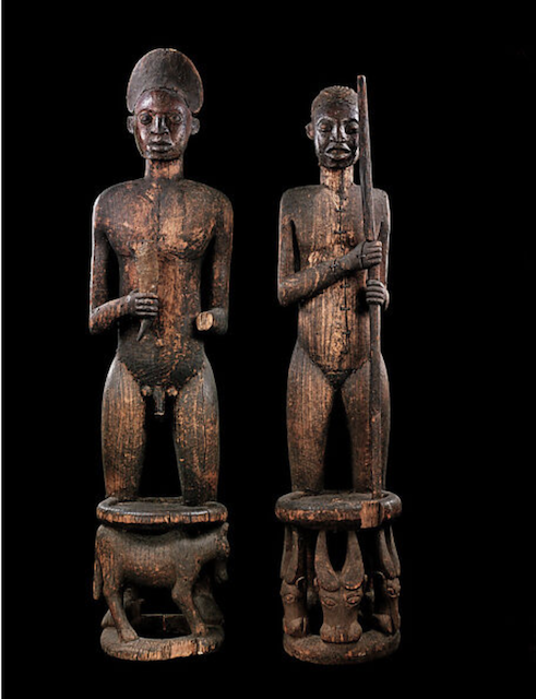 Commemorative thrones of Chief Tufoyn and Queen Mother Naya Artist: Yu, Fon of Kom (1830–1912) Date: Mid-19th century Geography: Cameroon, Grassfields region, Laikom Medium: Wood, copper Dimensions: H.: Male 74 7/8 in. (190 cm), Female 72 7/8 in. (185 cm) Classification: Wood-Sculpture.